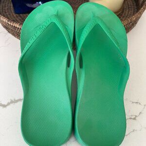 Like new Archies flip flops green size 10